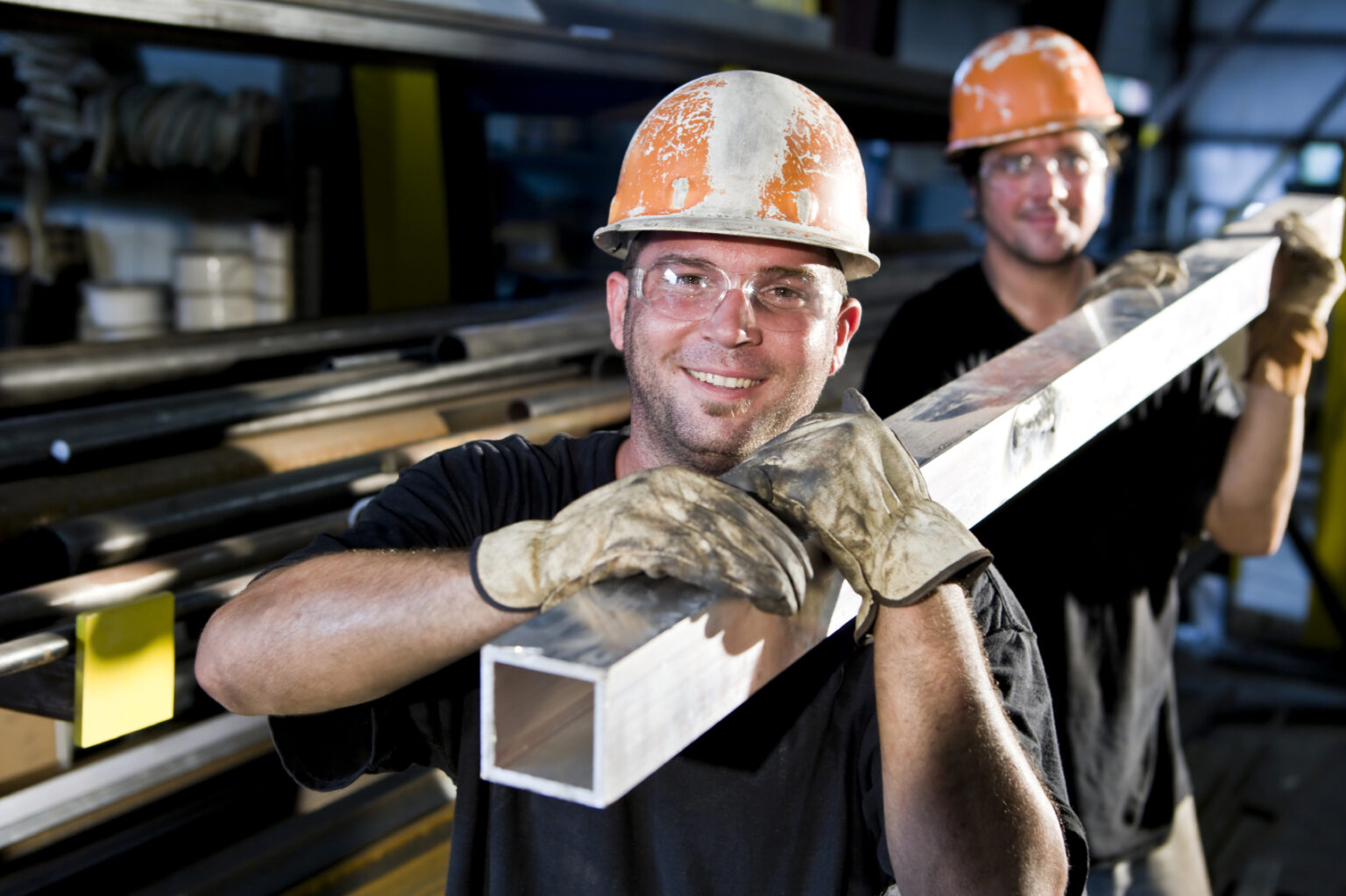 Construction workers in hard hats working